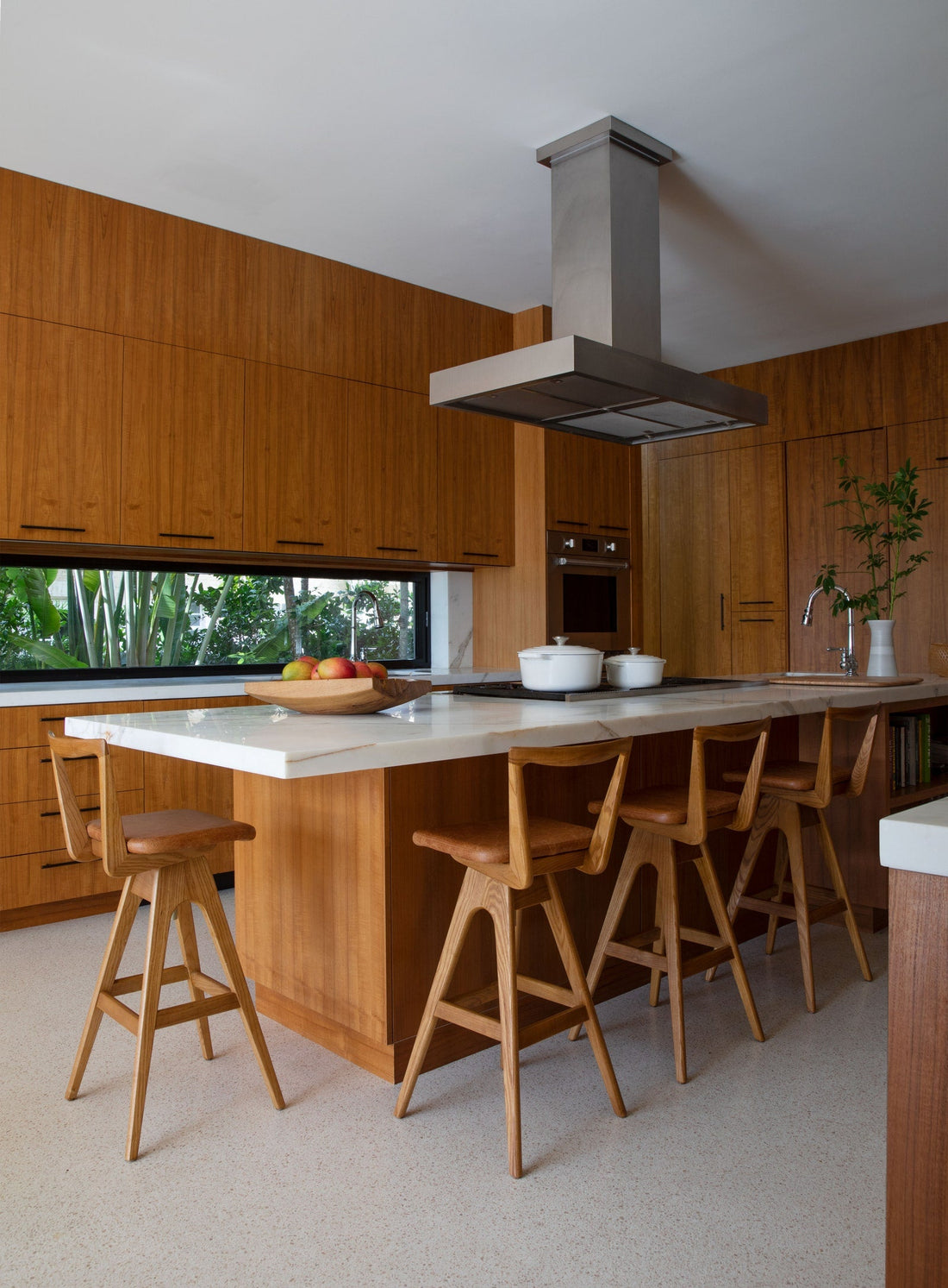 TH Brown Danish Bar Stools in timber around a contemporary kitchen island, iconic Australian mid-century modern furniture handcrafted in Adelaide