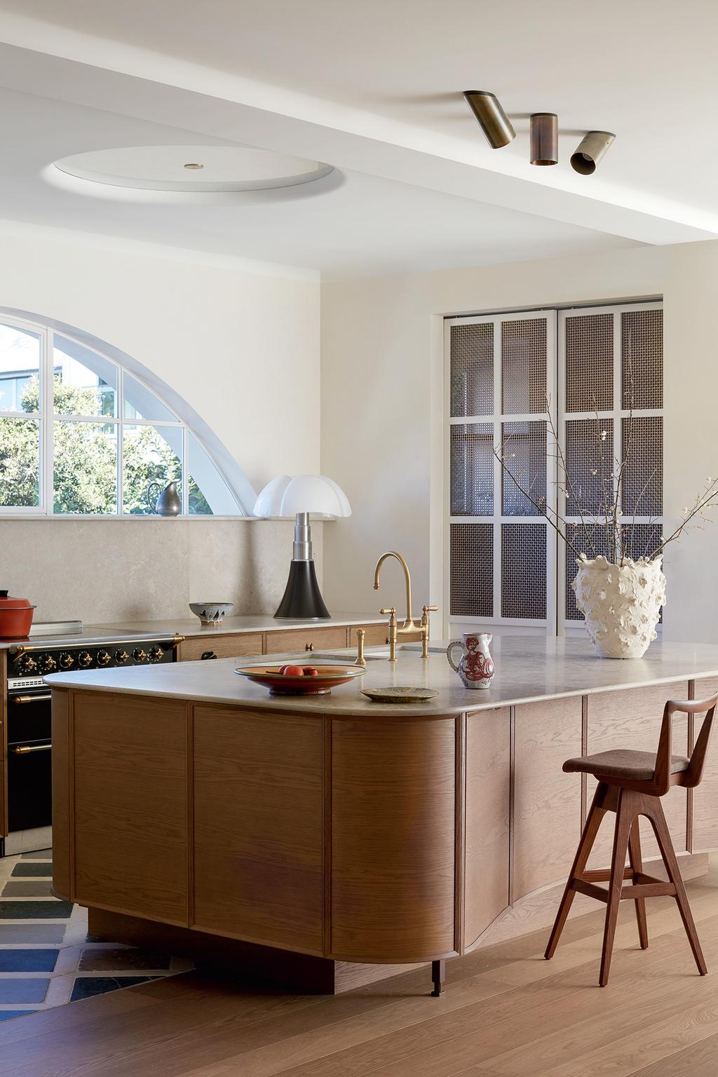 TH Brown Danish Bar Stool in timber at a contemporary kitchen island, iconic Australian mid-century modern furniture handcrafted in Adelaide