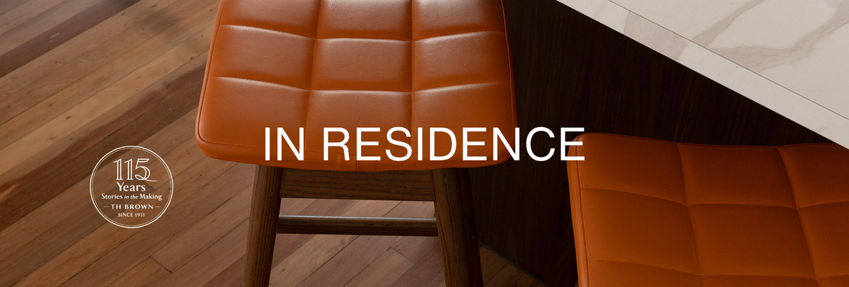 TH Brown In Residence: House 15 in Yeronga, Brisbane, featuring the iconic Australian-made Martelle Bar Stool in Dark Ash and Calypso orange.