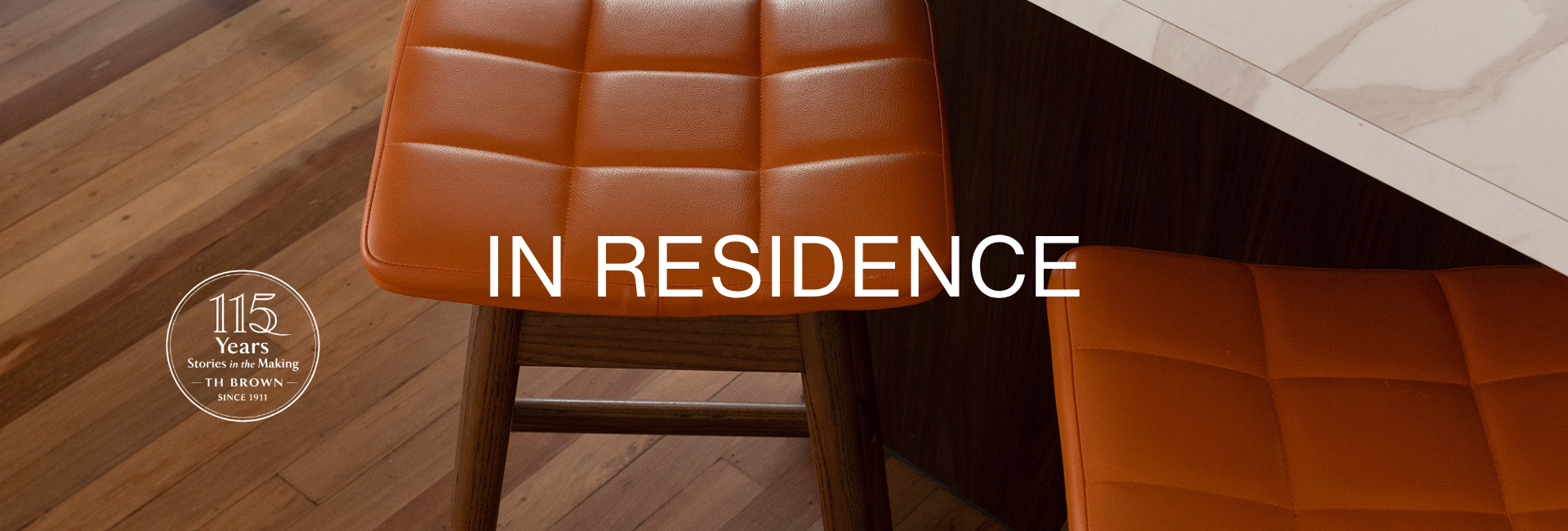 TH Brown In Residence: House 15 in Yeronga, Brisbane, featuring the iconic Australian-made Martelle Bar Stool in Dark Ash and Calypso orange.