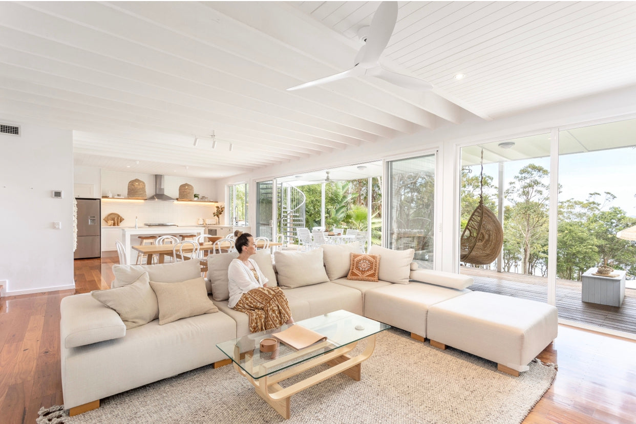 TH Brown Aquarius Coffee Table in Clear Ash, styled in a bright coastal living room for relaxed, light-filled Australian living.
