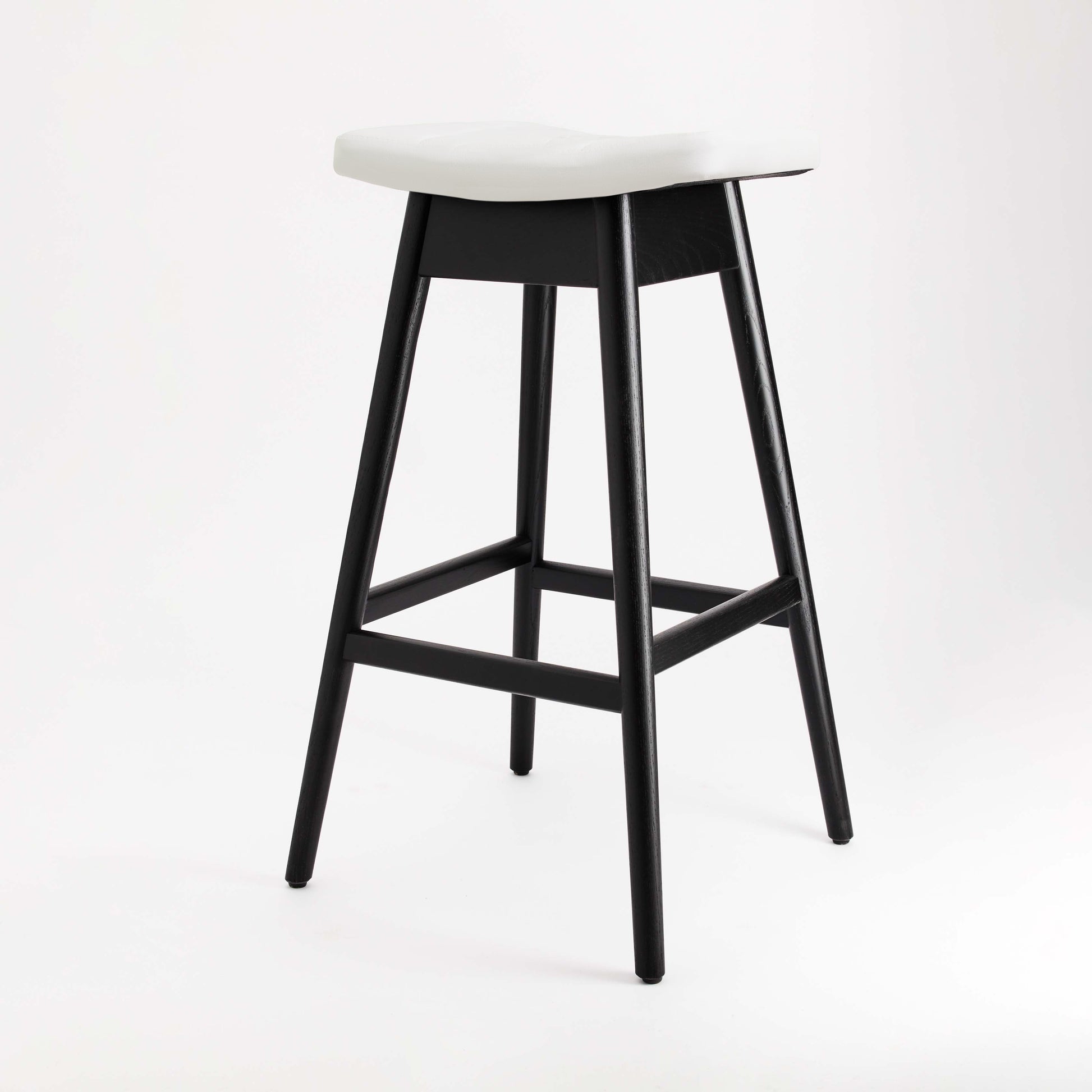 TH Brown Martelle Bar Stool in Arctic White with Matt Black frame, blending crisp contrast and sculptural form for stylish modern Australian living.