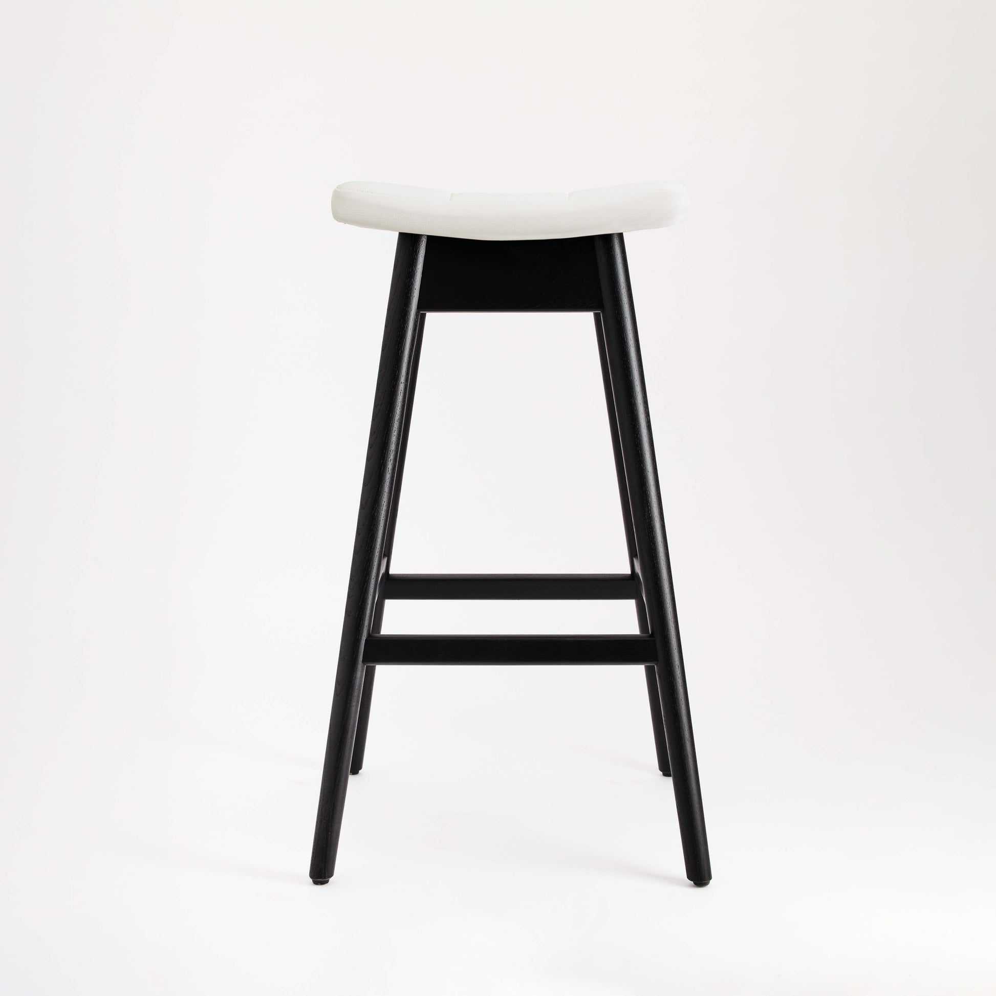 TH Brown Martelle Bar Stool in Arctic White with Matt Black frame, blending crisp contrast and sculptural form for stylish modern Australian living.