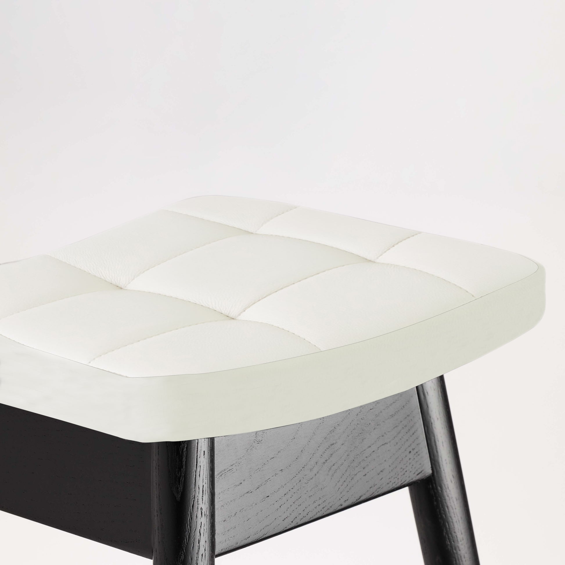 TH Brown Martelle Bar Stool in Arctic White with Matt Black frame, blending crisp contrast and sculptural form for stylish modern Australian living.