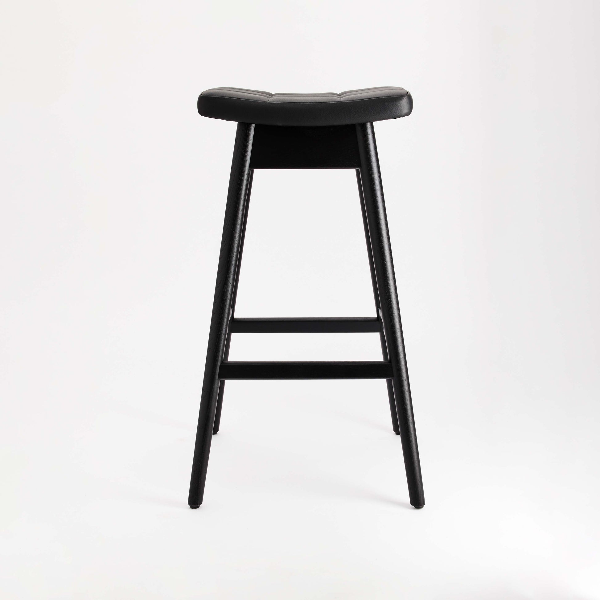 TH Brown Martelle Bar Stool in Black with Matt Black frame, creating a sleek monochrome statement for sophisticated modern Australian living.
