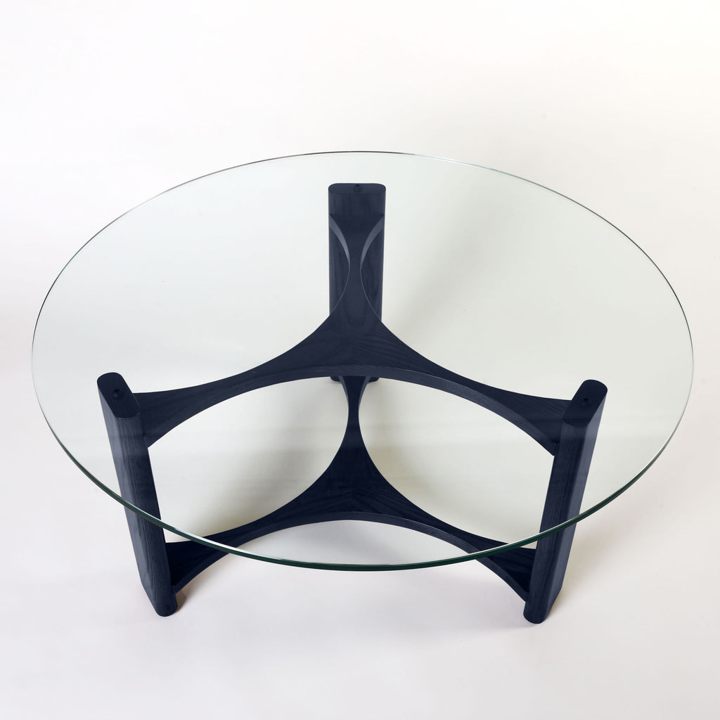 TH Brown Rondo Coffee Table in Matt Black, showcasing its bold tabletop and sculptural mid-century form for sophisticated modern Australian living.