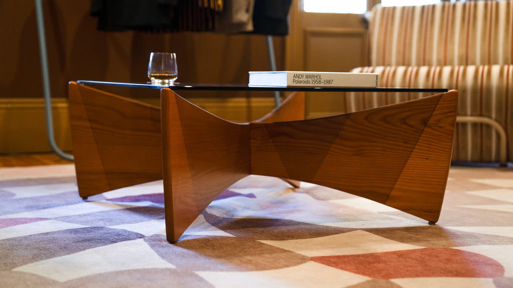 TH Brown Venus Coffee Table in Teak Ash with Grey Glass, blending warm timber tones and sculptural form for refined modern Australian living.
