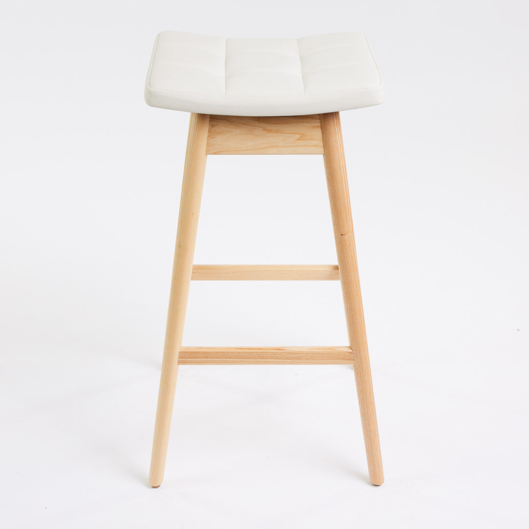 TH Brown Martelle Bar Stool in Arctic White with Clear Ash frame, blending crisp upholstery and natural timber for fresh modern Australian living.