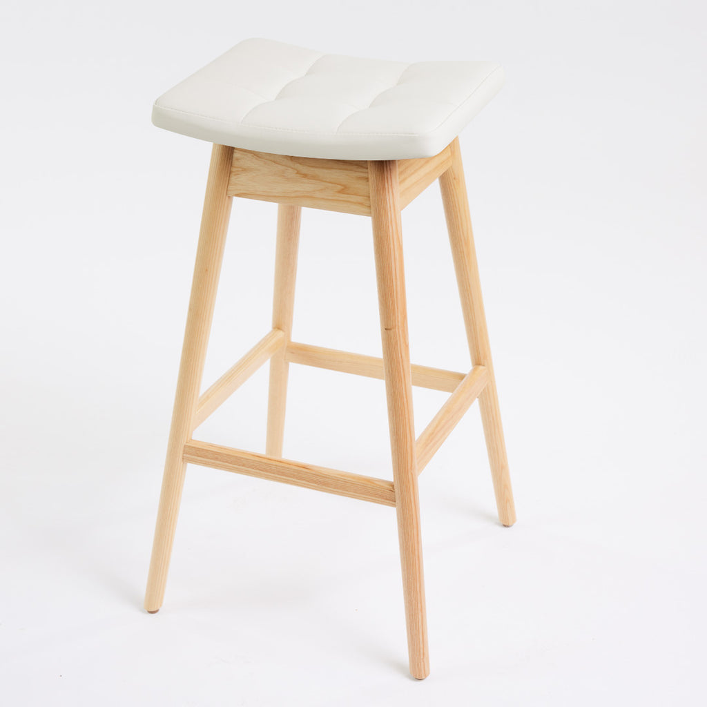 TH Brown Martelle Bar Stool in Arctic White with Clear Ash frame, blending crisp upholstery and natural timber for fresh modern Australian living.