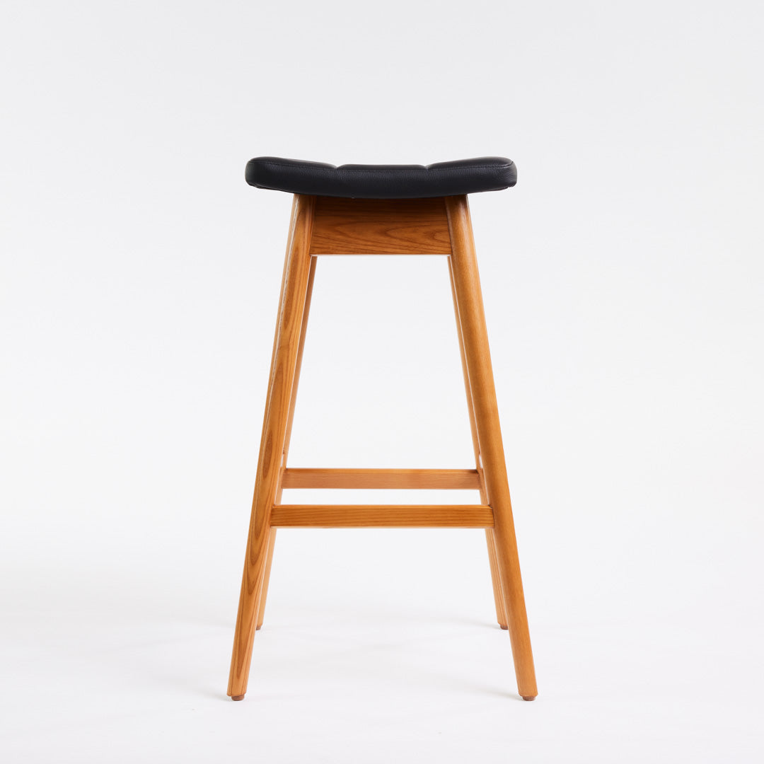 TH Brown Martelle Bar Stool in Black with Teak Ash frame, blending bold upholstery and warm timber for sophisticated modern Australian living.