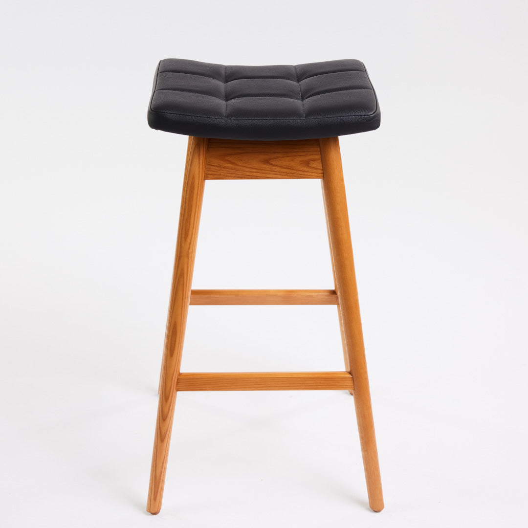 TH Brown Martelle Bar Stool in Black with Teak Ash frame, blending bold upholstery and warm timber for sophisticated modern Australian living.