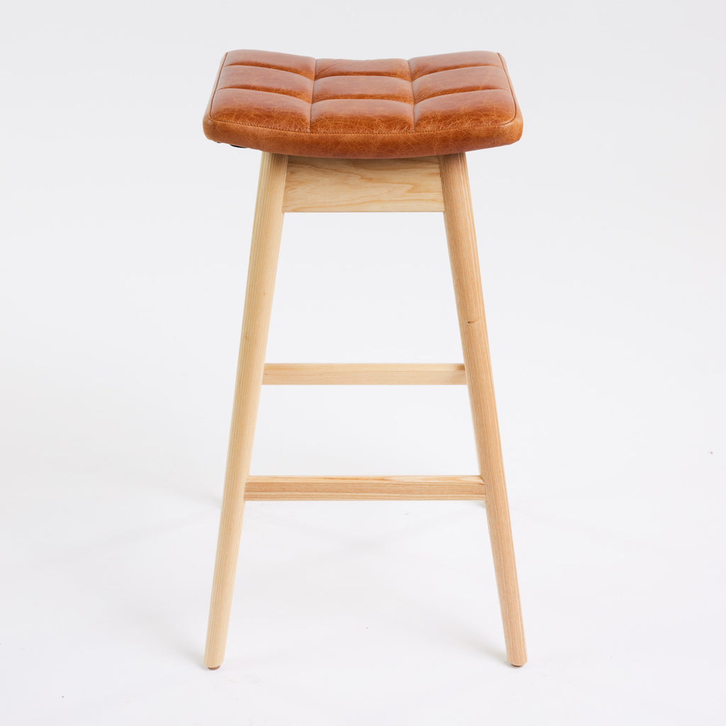 TH Brown Martelle Bar Stool in Oak Brown with Clear Ash frame, blending warm earthy upholstery and natural timber for relaxed modern Australian living.