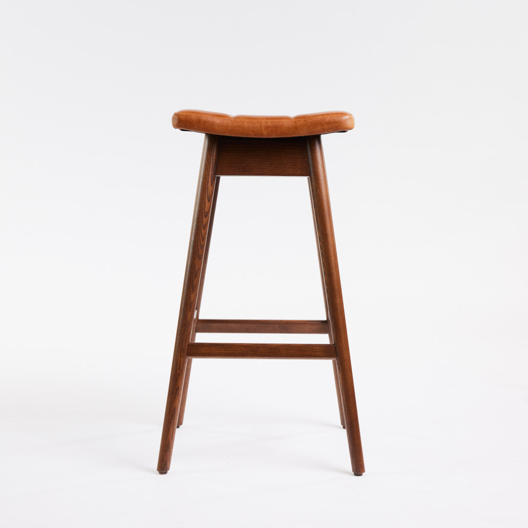 TH Brown Martelle Bar Stool in Oak Brown with Dark Ash frame, blending warm earthy upholstery and rich timber tones for sophisticated modern Australian living.