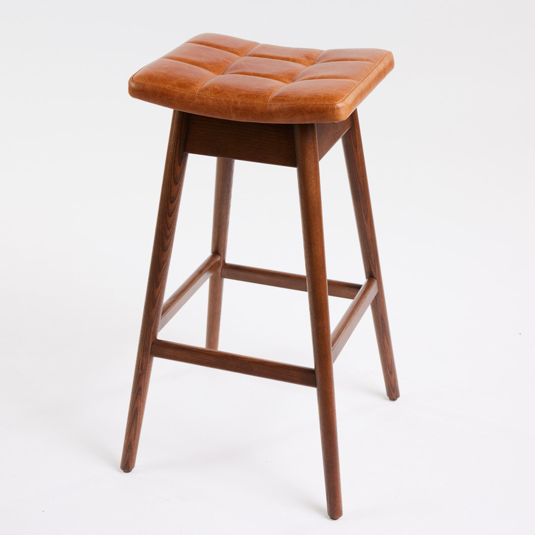 TH Brown Martelle Bar Stool in Oak Brown with Dark Ash frame, blending warm earthy upholstery and rich timber tones for sophisticated modern Australian living.