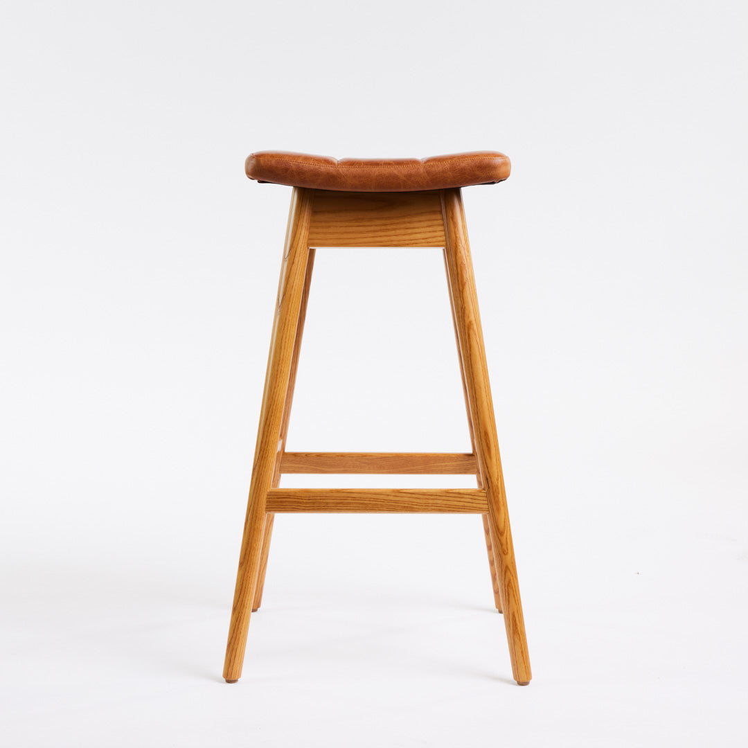TH Brown Martelle Bar Stool in Oak Brown with Light Ash frame, blending warm earthy upholstery and pale timber for relaxed modern Australian living.