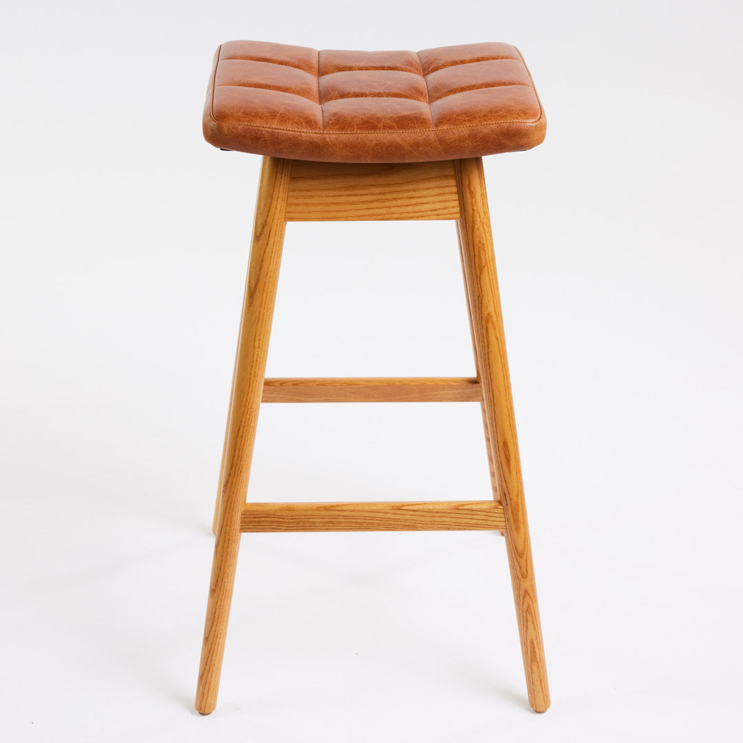 TH Brown Martelle Bar Stool in Oak Brown with Light Ash frame, blending warm earthy upholstery and pale timber for relaxed modern Australian living.