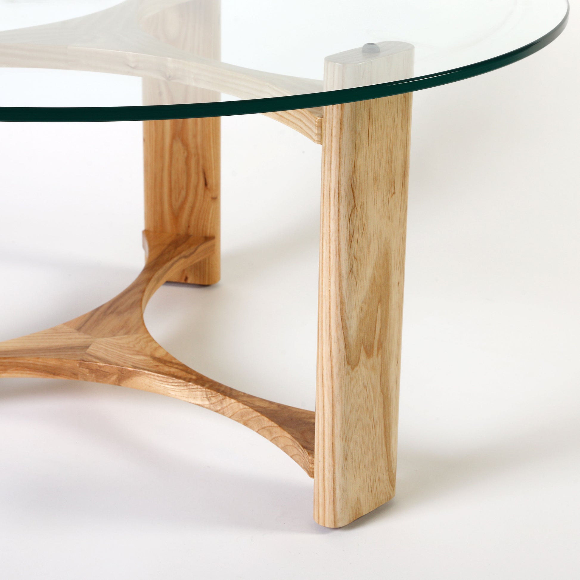 TH Brown Rondo Coffee Table in Clear Ash, showcasing its natural timber top and sculptural mid-century form for modern Australian living.