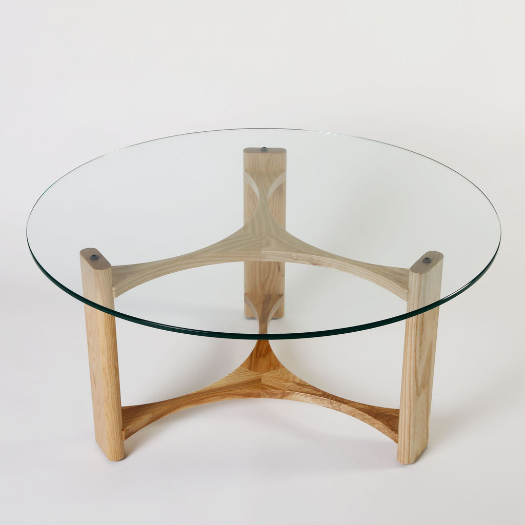 TH Brown Rondo Coffee Table in Clear Ash, showcasing its natural timber top and sculptural mid-century form for modern Australian living.