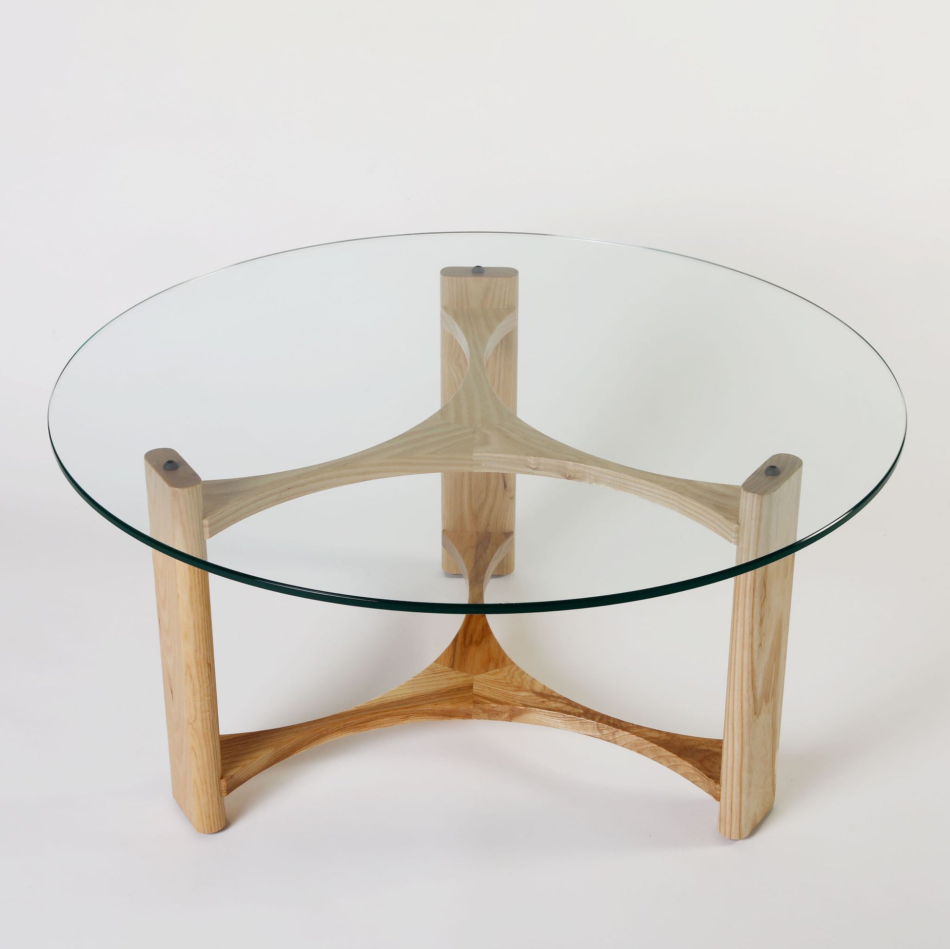 TH Brown Rondo Coffee Table in Clear Ash, showcasing its natural timber top, sculptural form and timeless mid-century Australian design.