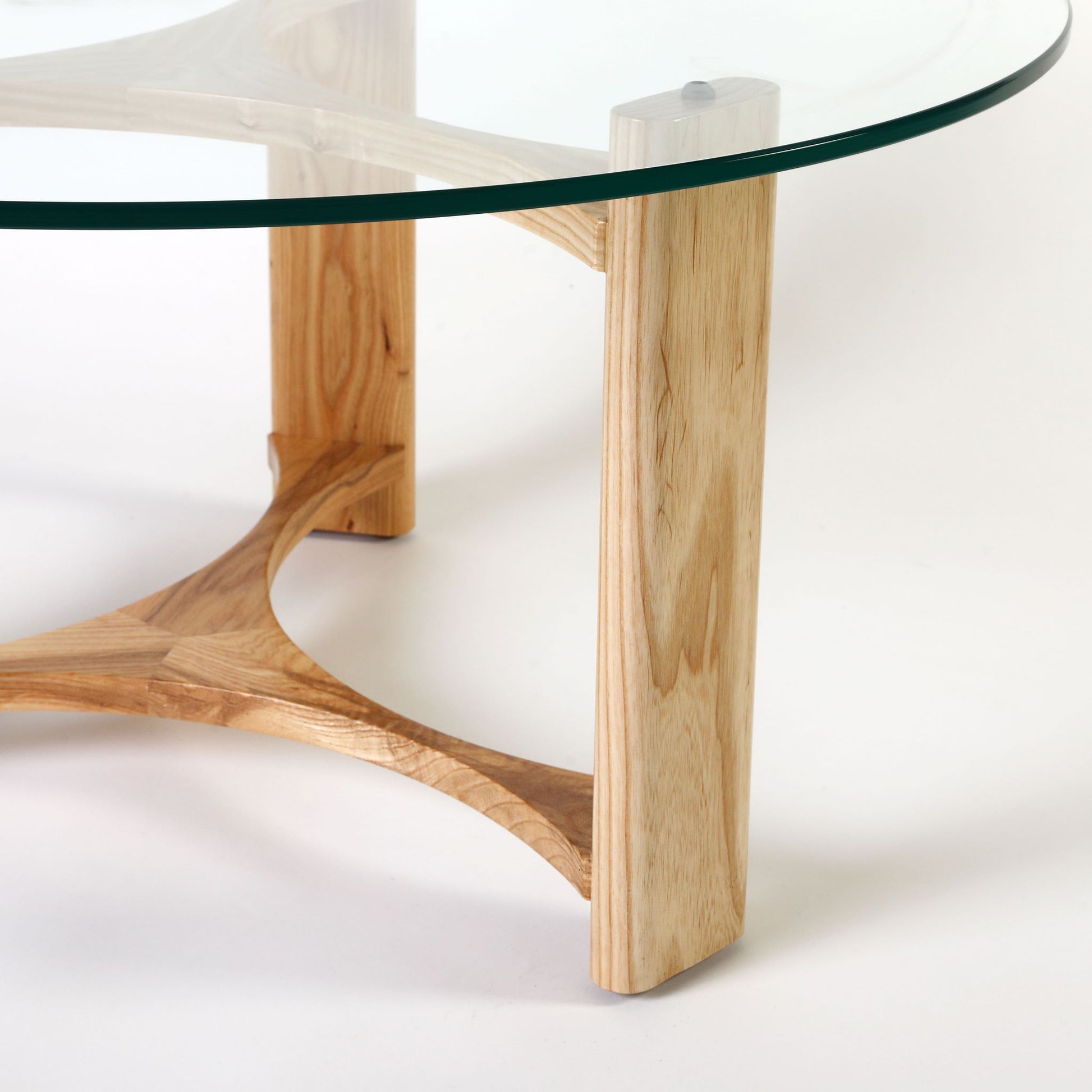 TH Brown Rondo Coffee Table in Clear Ash, showcasing its natural timber top and sculptural mid-century form for modern Australian living.